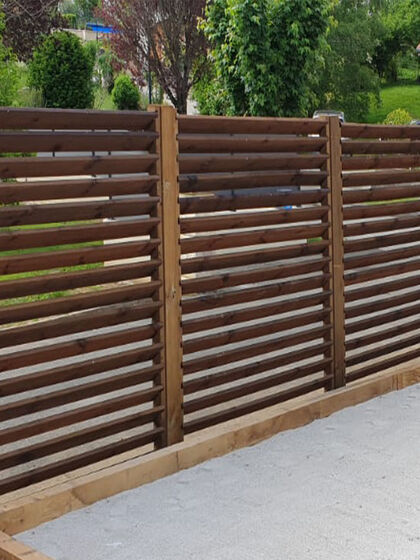 louvered wood fence