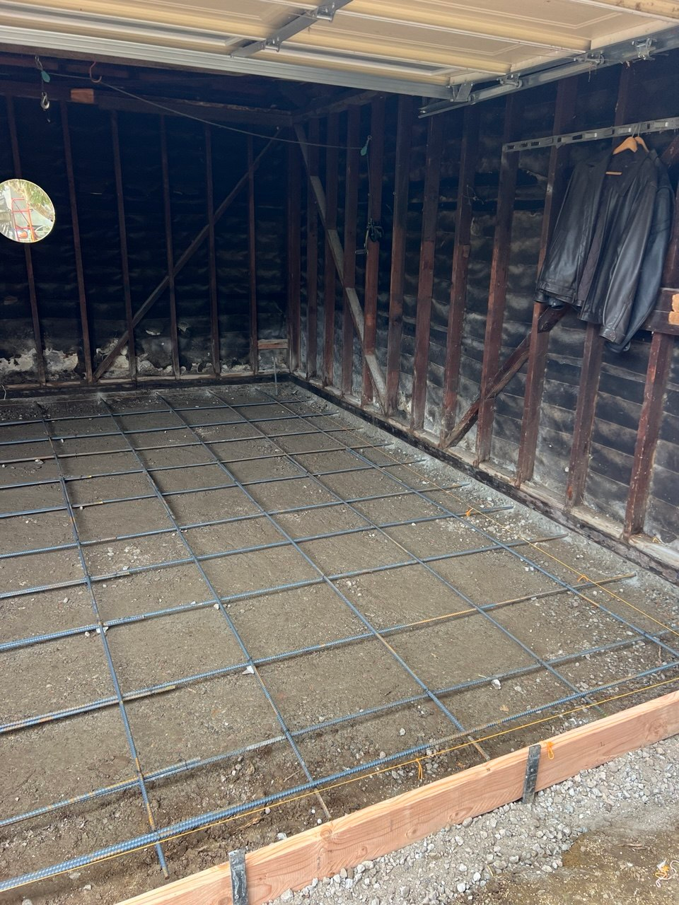 Detailed view of stabilized gravel base and installed engineered rebar grid