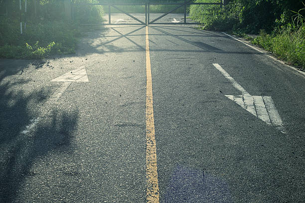 Why Heavy Gates and Soft Asphalt Don’t Mix (The Secret to a Gate That Never Jams)